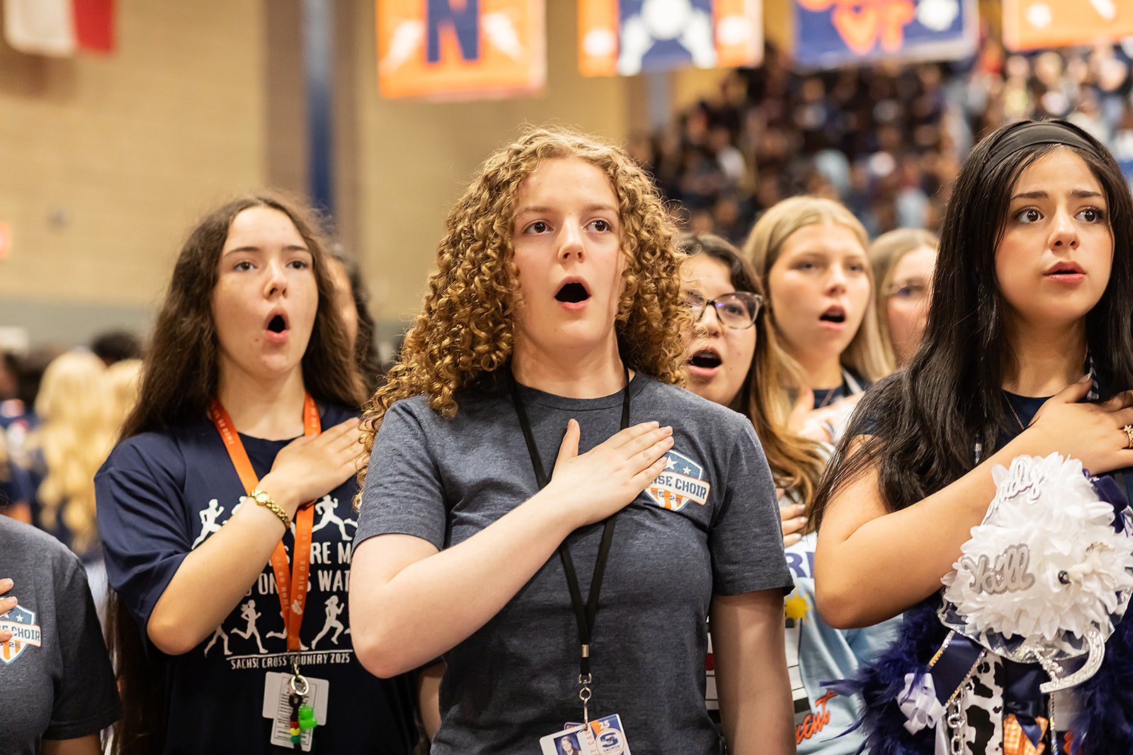 A Cappella singers at a pep rally