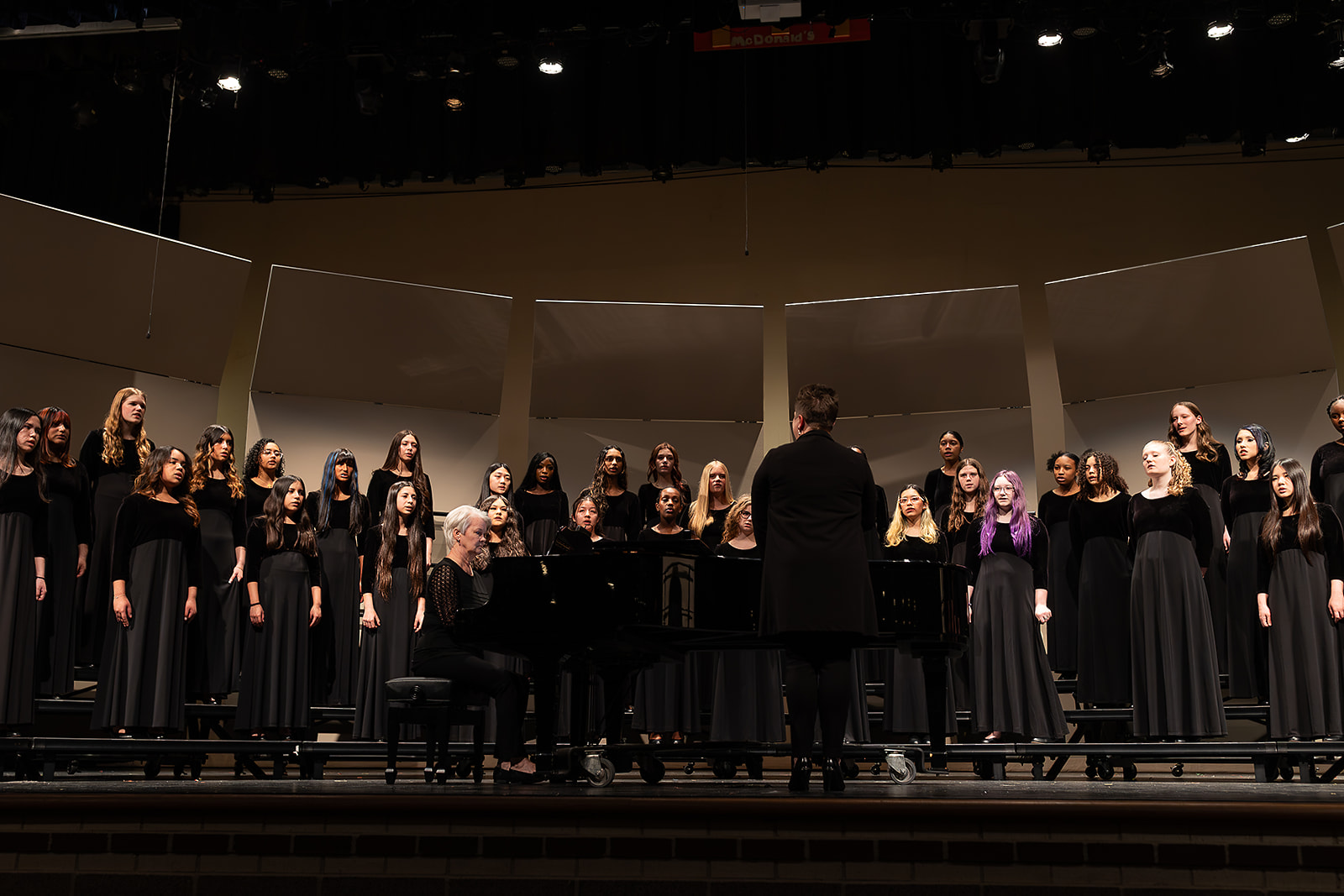 Concert Chorale performing on stage