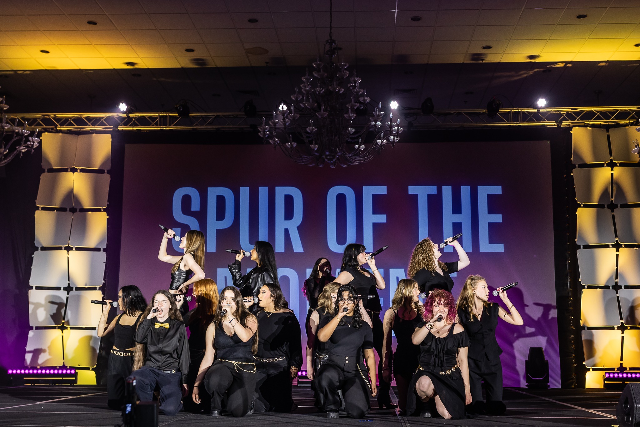 Spur of the Moment performing on stage