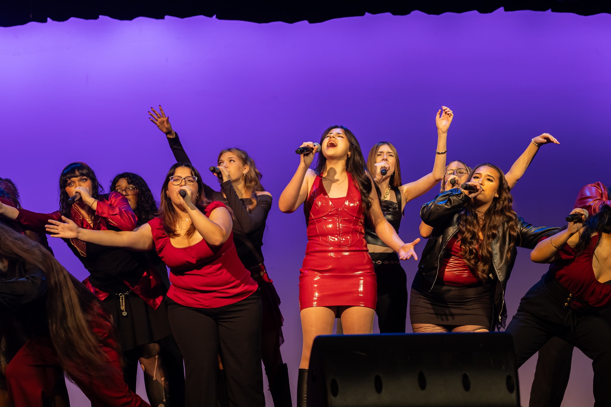 Spur of the Moment singers performing